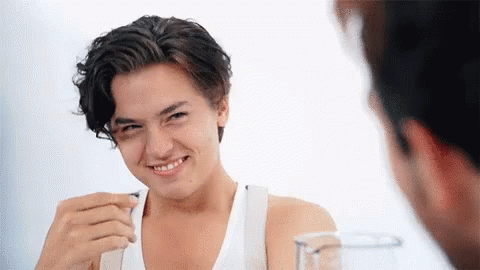 Image result for cole sprouse laughing gif