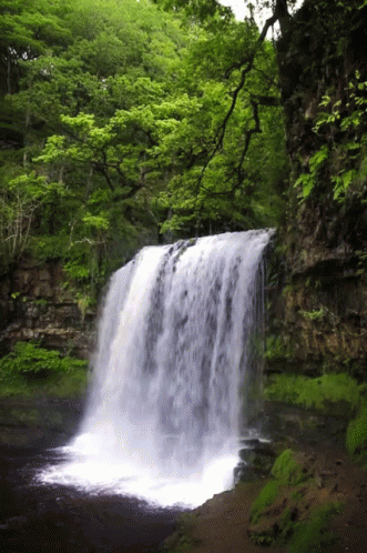 over waterfall gif first person
