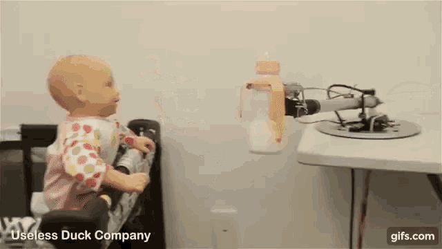 images Baby Bottle Gif feeding bottle gif feeding bottle robot discover share gifs