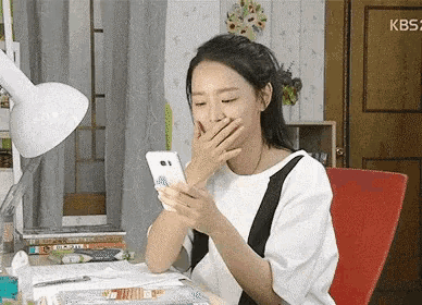 A girl reacting to her texts similar how I was reacting with the narcissist