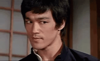 Bruce Lee Frown GIF - BruceLee Frown Disapprove GIFs