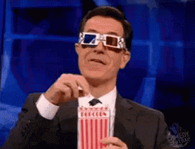Stephen Colbert Eating GIF - StephenColbert Eating Popcorn GIFs