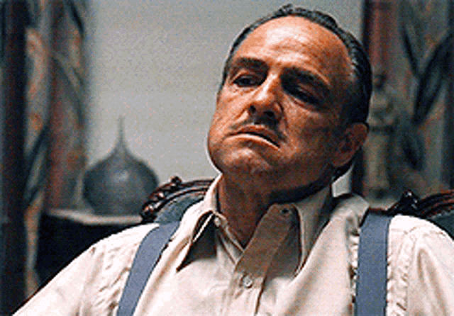Godfather Face GIF - Godfather Face NotImpressed - Discover & Share GIFs