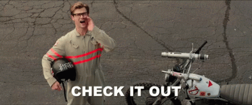 Gif of man saying "check it out" and pointing to the right.