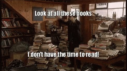 Image result for piles of books gif