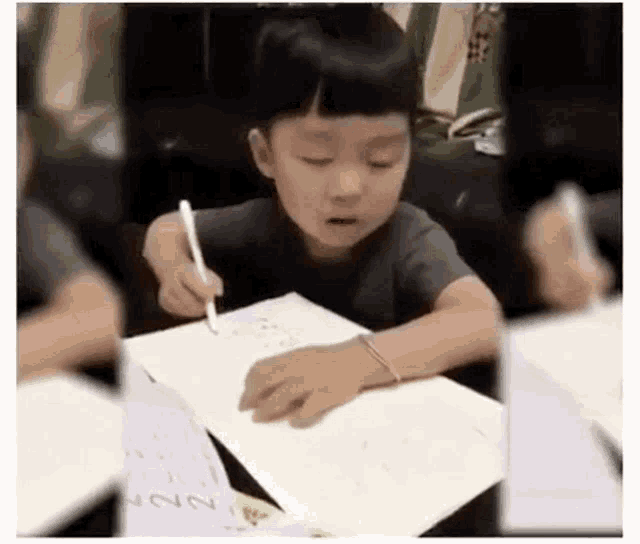 kid doing homework gif