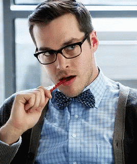 Image result for hot man eating licorice