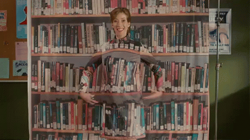 Librarian In Library Dress GIF - LibraryDress Camouflage Librarian GIFs