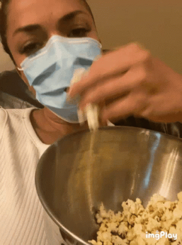 Mask Eating GIF - Mask Eating Popcorn - Discover & Share GIFs