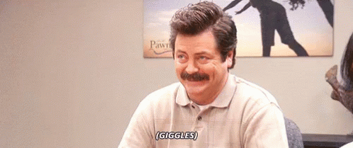 Ron Swanson Giggles GIF - RonSwanson Giggles Laugh GIFs