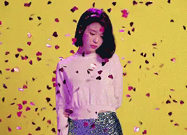 Depressed GIF - Girl Confetti Hearts - Discover & Share GIFs