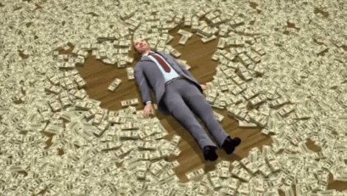 Image result for rolling around in money gif