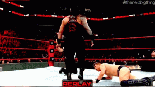 roman reigns superman punch gif romanreigns supermanpunch