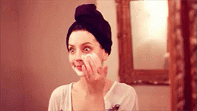 Putting On Face Mask GIF - Pampered FaceMask NightIn - Discover & Share GIFs