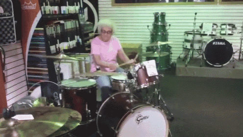 Rock On, Grandma! GIF - Grandma Lady Drummer - Discover & Share GIFs