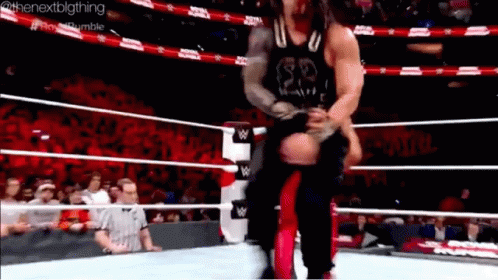 roman reigns superman punch gif romanreigns supermanpunch