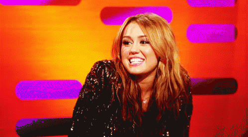 Miley Cyrus Grimace GIF - MileyCyrus Confused Unsure GIFs