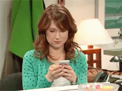 Receiving A Happy Text - The Office GIF - TheOffice ErinHannon EllieKemper GIFs