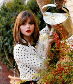 Image result for clara oswald watering flowers