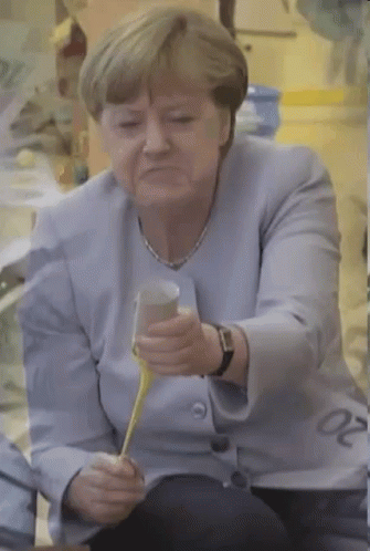 Angela Merkel Celebrate GIF - AngelaMerkel Celebrate Popper GIFs