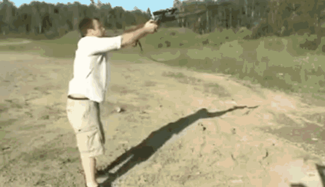 Gun Shooting GIF - Gun Shooting Recoil GIFs