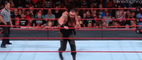 roman reigns superman punch gif romanreigns supermanpunch