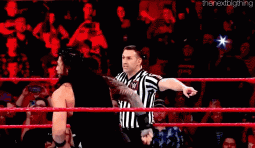 roman reigns superman punch gif romanreigns supermanpunch cesaro