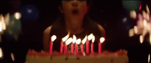 Risultati immagini per blowing birthday cake gif
