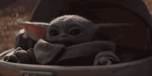 Image result for the mandalorian baby yoda gif