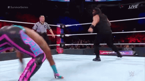 roman reigns superman punch gif romanreigns supermanpunch wwe