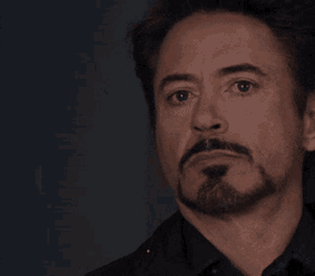 Image result for iron man eye roll gif