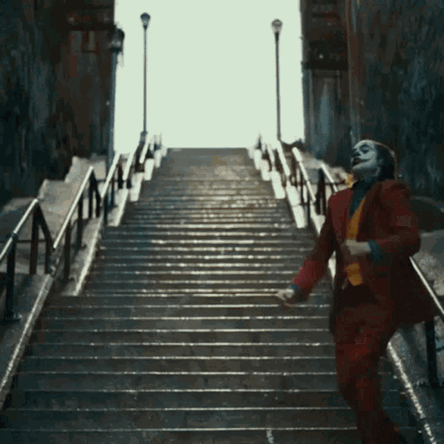 Joker Dance GIF - Joker Dance Stairs - Discover & Share GIFs