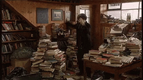 Pile Of Books GIF - Library Pile Books - Discover & Share GIFs