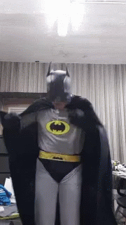 Бэтмен гиф. Бэтмен танцует. Жириновский в костюме Бэтмена. Гифка Бэтмен танцует.