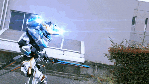 a robot is holding a sword in front of a building with a blue light behind it