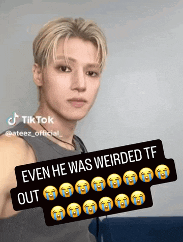 a young man with tears on his face and the caption even he was weirded tf