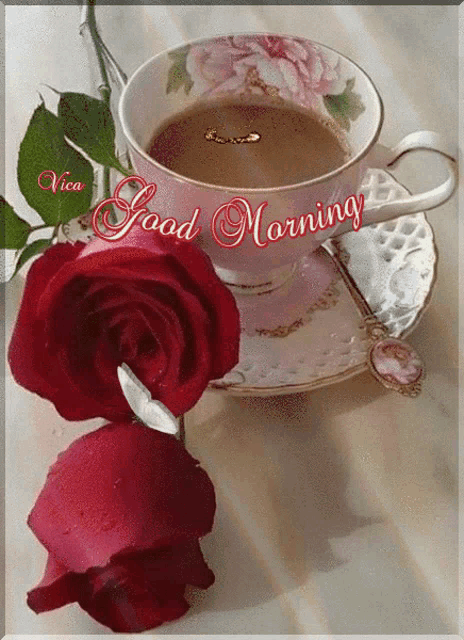a cup of coffee on a saucer with the words good morning written on the top