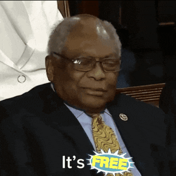 a man in a suit and tie says it 's free in a speech bubble