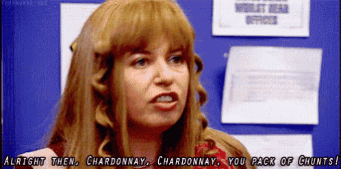 a woman with red hair is talking about chardonnay and you pack of chunts .