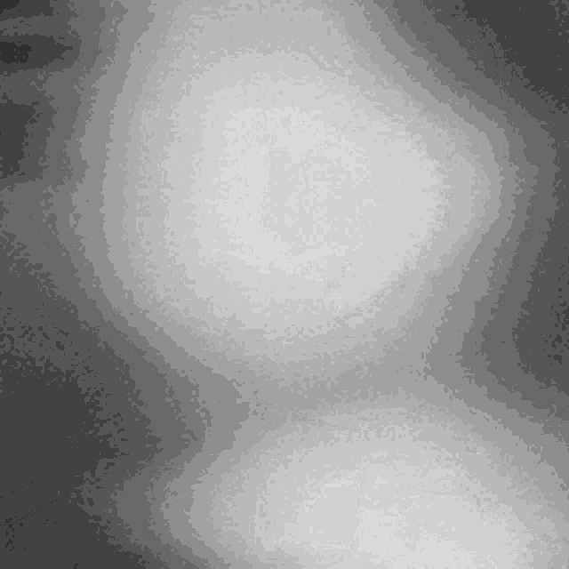 a black and white photo of a person 's face with a white circle in the middle .