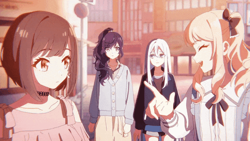 a group of anime girls are walking down a street and one girl is pointing at something