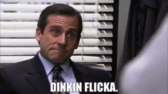 a man in a suit and tie is standing in front of a window with blinds and says `` dinkin flicka '' .