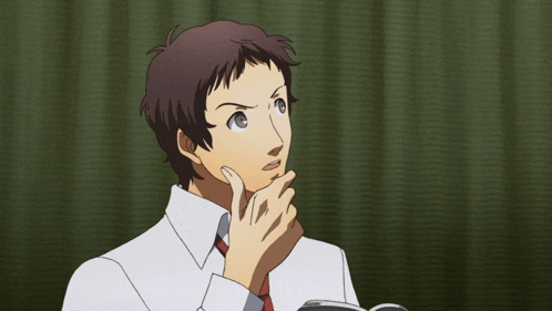 a man in a white shirt and red tie is being slapped in the face