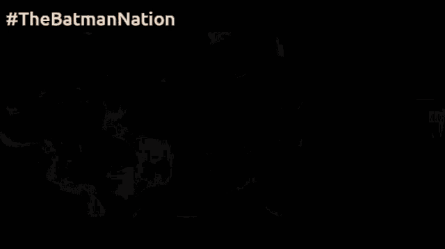 a man is wrapped in plastic and has #thebatmannation written on the top