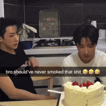 two men are sitting at a table with a cake and the caption bro should ve never smoked that shit