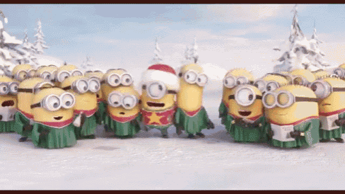 a group of minions are standing in the snow wearing christmas costumes