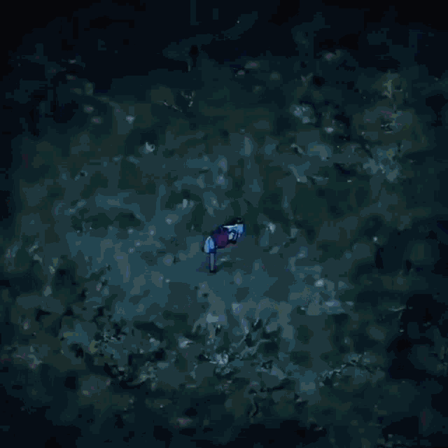 a pixel art of a person in a purple and blue space