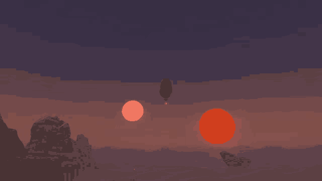 a hot air balloon is flying over a desert landscape