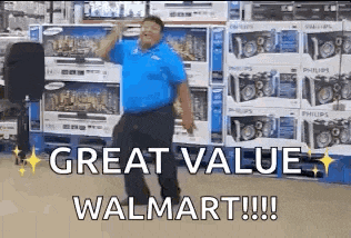 a man in a blue shirt is dancing in front of a stack of boxes in a store .