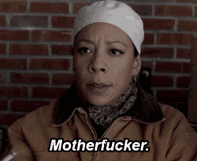 a woman wearing a hat and a jacket says motherfucker